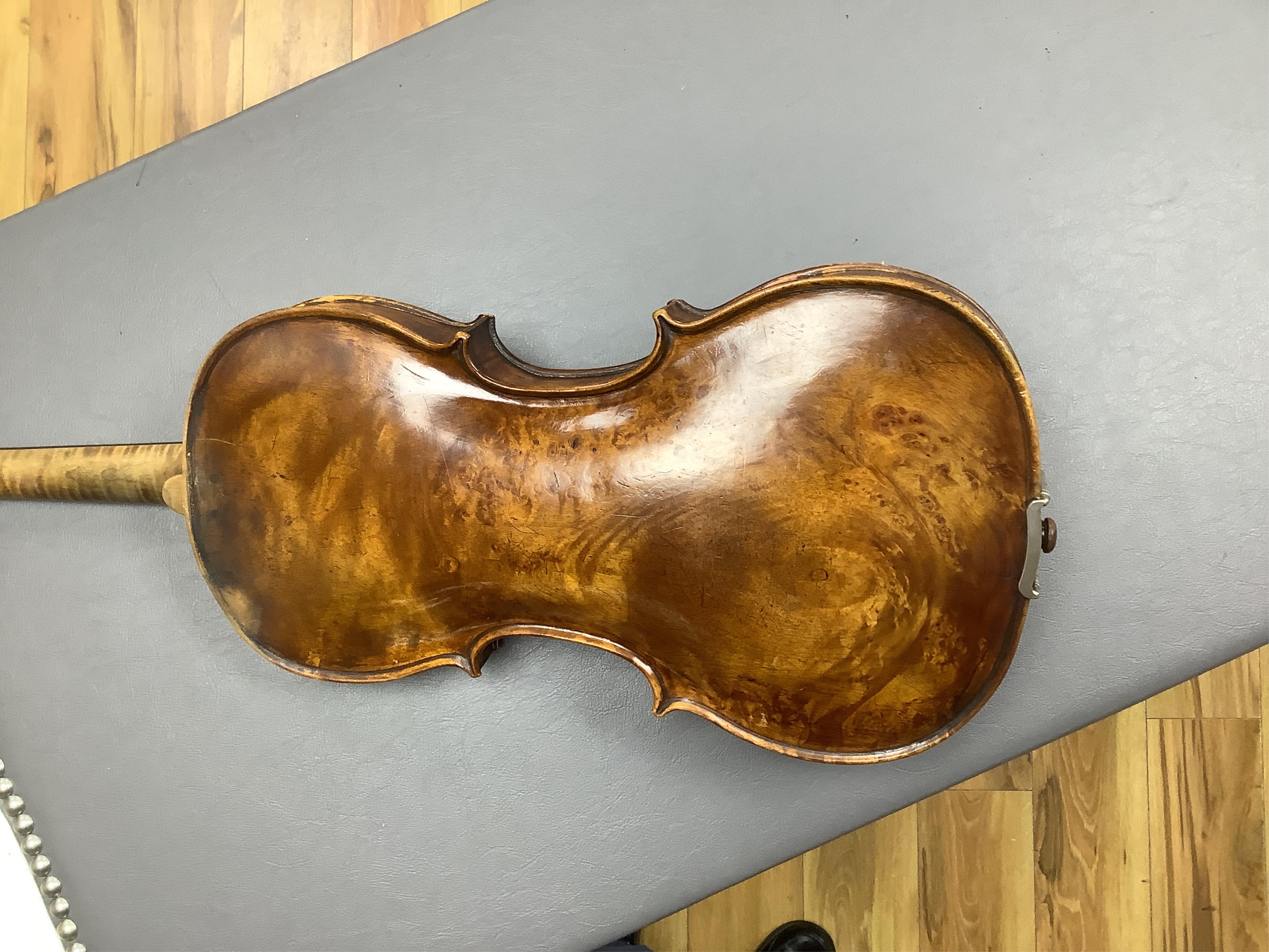 An interesting late 18th century violin, with one piece bird’s eye maple back, unsigned, with two silver fully mounted octagonal bows, one stamped Voight CITES Submission reference, 3XFNUBT7 and Submission reference, RHL